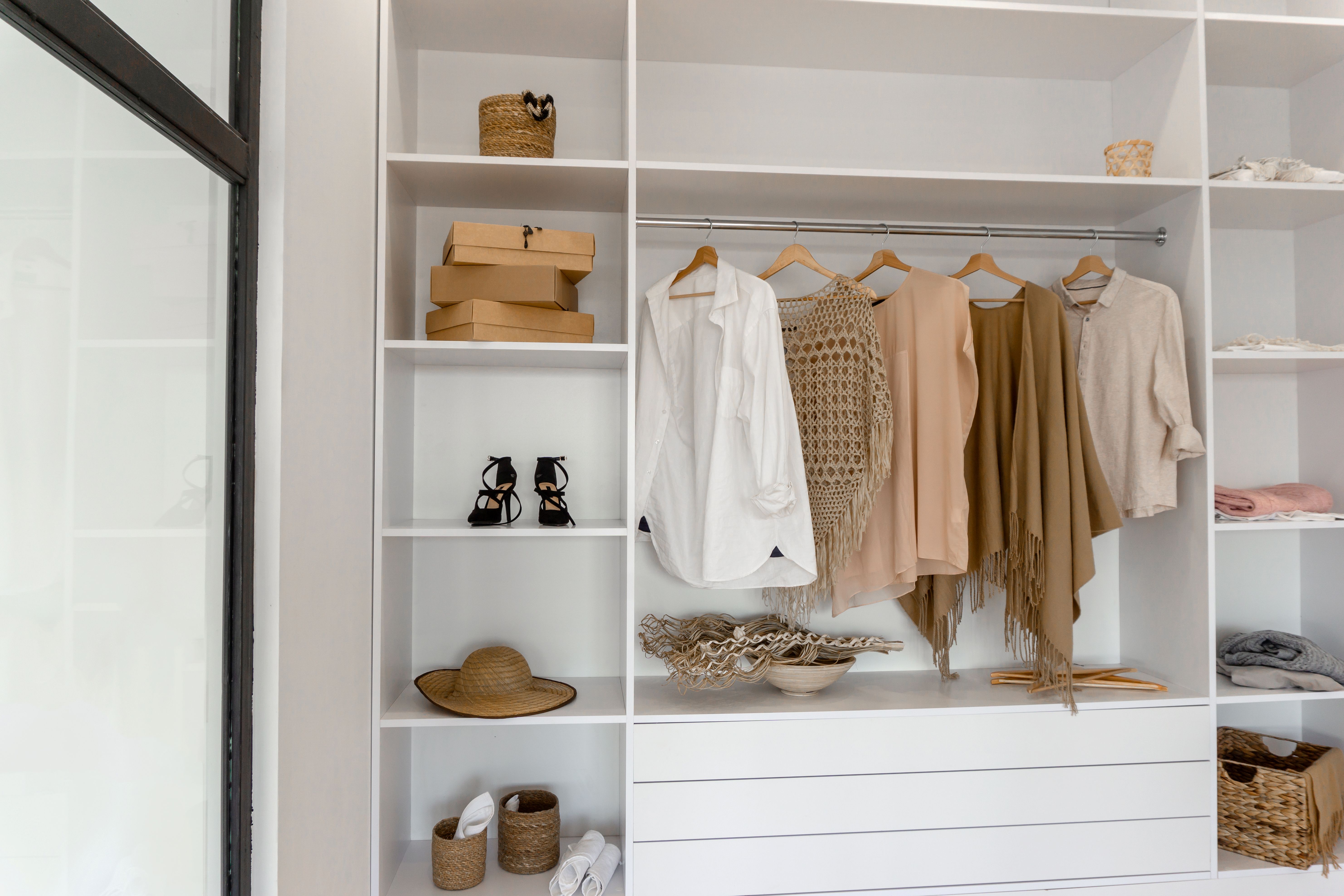 Walk-in closet featuring VelourTouch Cotton Mist VT02